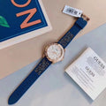 Guess Swirl Analog Quartz White Dial Blue Rubber Strap Watch for Women - W1096L4