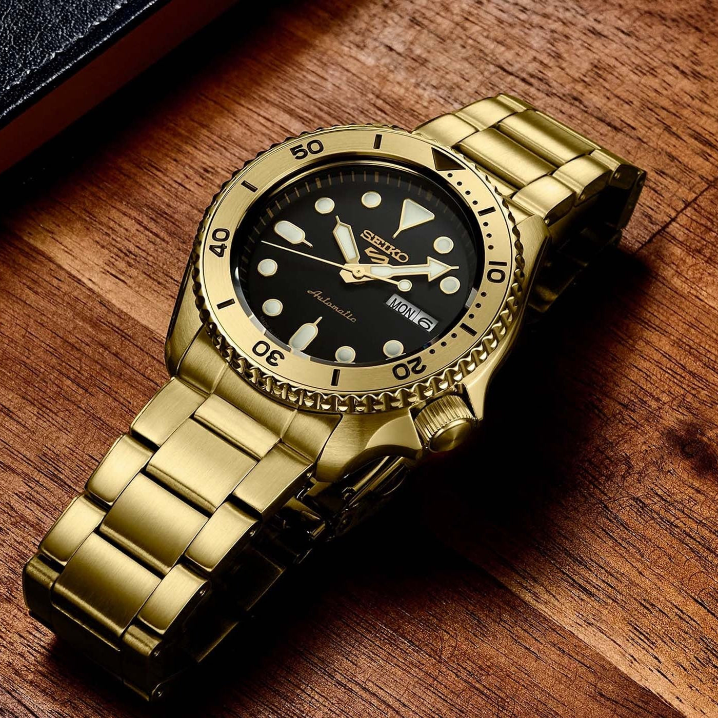 Seiko 5 Sports Automatic Black Dial Gold Steel Strap Watch For Men - SRPK18