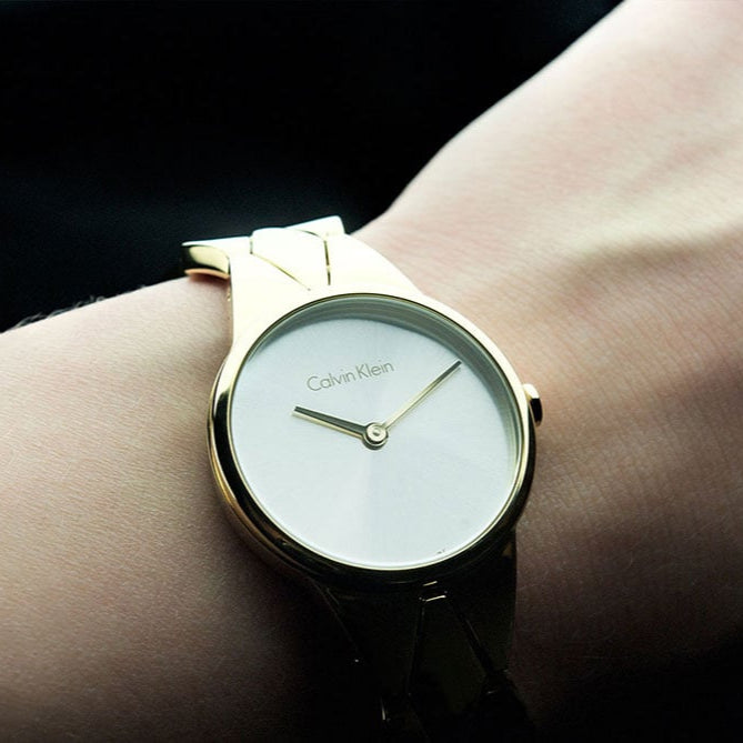 Calvin Klein Snake Silver Dial Yellow Gold Steel Strap Watch For Women - K6E23546