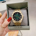 Guess Asset Quartz Green Dial Gold Steel Strap Watch For Men - GW0575G2